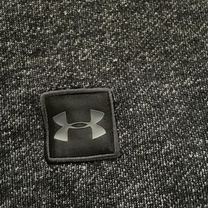 Under Armour short sleeve sweater-like top. It is XL but fits more like an L.